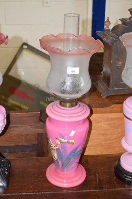 Lot 326 - Victorian oil lamp with frilled shade and pink...
