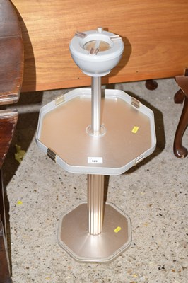 Lot 329 - An Art Deco style metal pedestal table and...