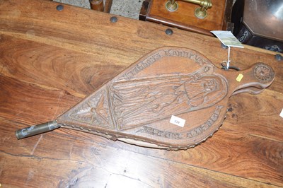 Lot 339 - A pair of carved oak fire bellows made for...