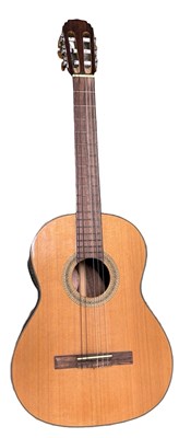 Lot 136 - A Cort 6-string acoustic guitar, model number:...