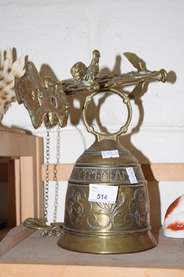 Lot 514 - A wall mounted brass bell
