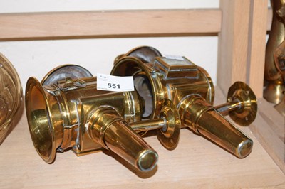 Lot 551 - A pair of brass carriage lamps