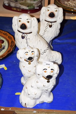 Lot 554 - Two pairs of Staffordshire dogs