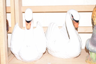 Lot 564 - A pair of model swan jardinieres