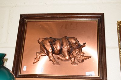 Lot 579 - A relief coppered image of a Rhino, framed
