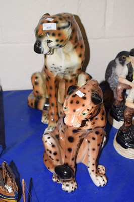 Lot 593 - Two pottery models of leopards