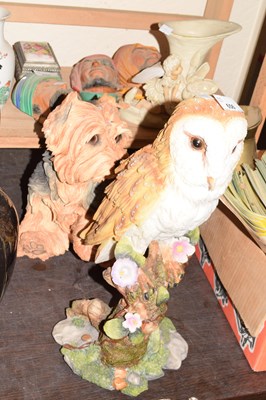 Lot 656 - Resin model of an owl and another of a Terrier