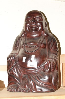 Lot 659 - Pottery model of a Buddha