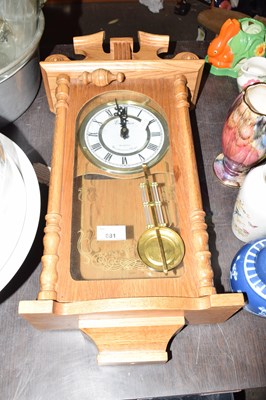 Lot 681 - Wooden wall clock