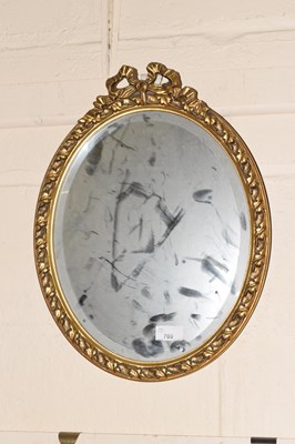 Lot 708 - Gilt framed oval wall mirror