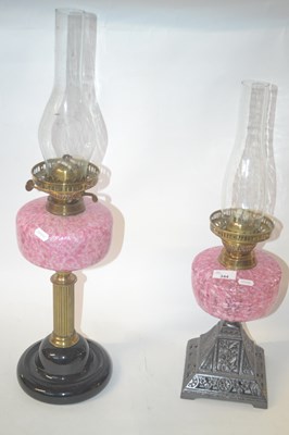 Lot 224 - Two 19th Century oil lamps, both with mottled...