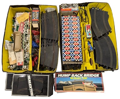 Lot 522 - 2 trays of various Scalextric accesories, to...