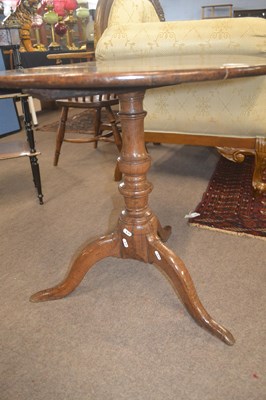 Lot 418 - A George III oak table with circular top,...
