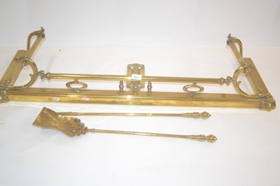Lot 515 - A Victorian brass fire fender and accompanying...