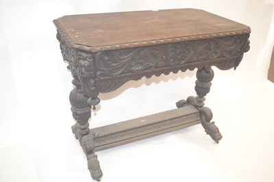 Lot 533 - A Victorian Gothic Revival oak centre table,...