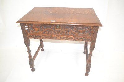 Lot 401 - A Victorian carved oak single drawer side...