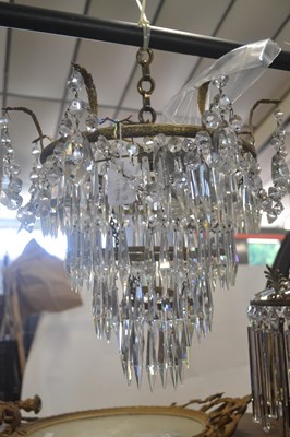 Lot 541 - A 20th Century circular four tier ceiling...