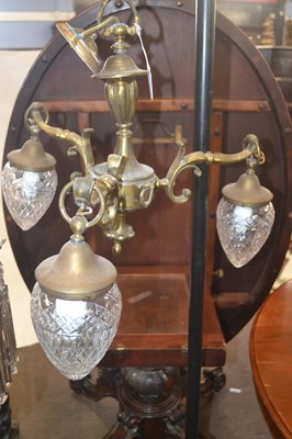 Lot 543 - A 20th Century brass framed three arm light...