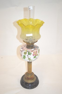 Lot 547 - A Victorian oil lamp fitted with a yellow...