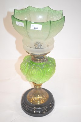 Lot 548 - A Victorian oil lamp with green tinted shade,...