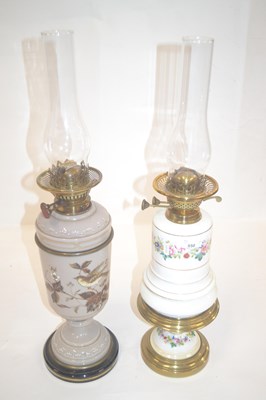 Lot 550 - Two Victorian oil lamp bases decorated with...