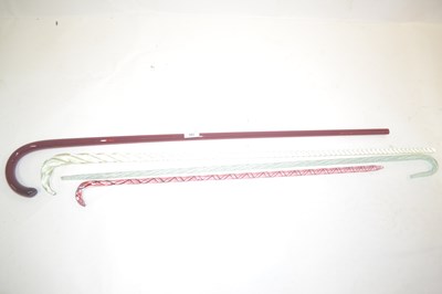 Lot 582 - Four Victorian glass walking canes comprising...