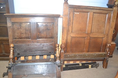 Lot 585 - Two 20th Century pairs of oak single bed ends...
