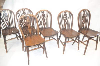 Lot 587 - Six Victorian elm and ash stick and wheel back...