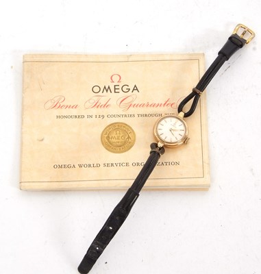 Lot 300 - A 9ct gold cased ladies Omega watch stamped on...