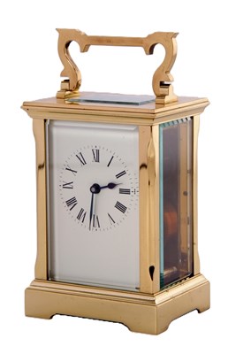 Lot 341 - A four glass brass carriage clock with swing...