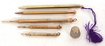 Lot 144A - Mixed Lot: Three gold-plated retractable...