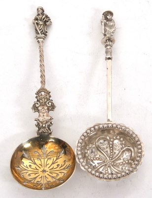 Lot 219 - Two late Victorian silver sifting spoons with...
