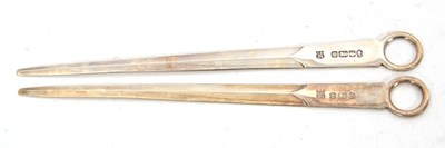 Lot 245 - Two Elizabeth II silver paper knives in the...