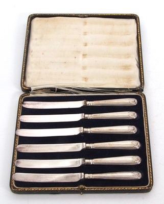 Lot 250 - A cased set of six silver handled tea knives,...