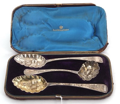 Lot 251 - Three cased Georgian berry spoons, two...