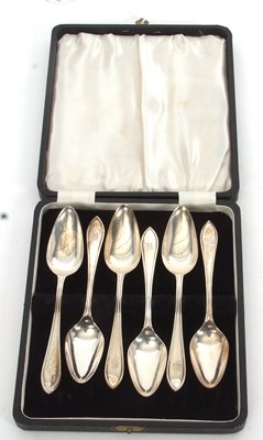 Lot 255 - A cased set of six silver grapefruit spoons,...