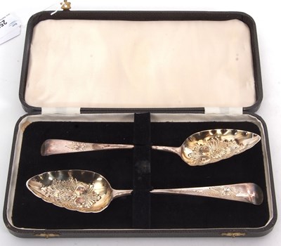Lot 256 - Two Georgian silver berry spoons, hallmarked...