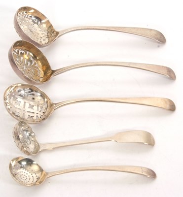 Lot 179 - A group of five antique sifting spoons, four...
