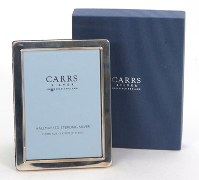Lot 205 - A Carrs silver photograph frame of plain...