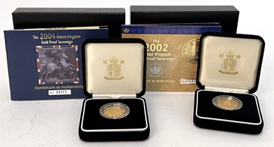 Lot 232 - Two Royal Mint gold proof sovereigns with...