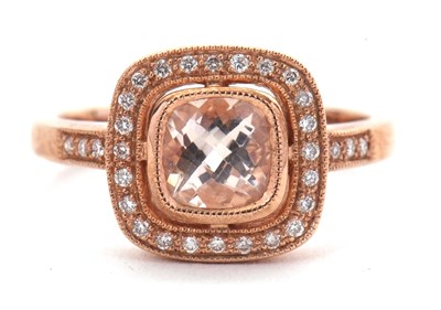 Lot 38 - A 9ct rose gold diamond and pink stone ring,...