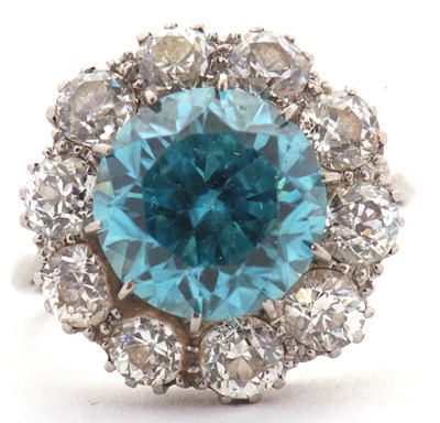 Lot 123 - A blue ziron and diamond ring, set to centre...
