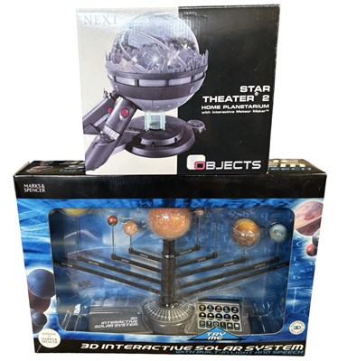 Lot 542 - A pair of astronomical toys, to include:  - 3D...