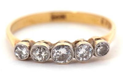 Lot 43 - An 18ct five stone diamond ring, the five...