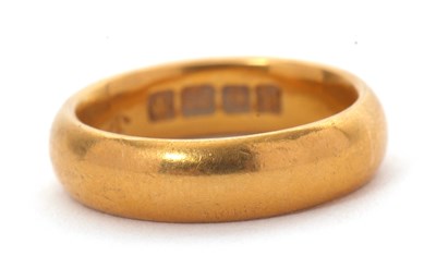 Lot 219 - A 22ct gold wedding ring, hallmarked...