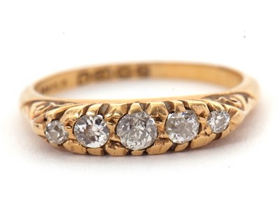 Lot 74 - An 18ct diamond ring, set with five slightly...