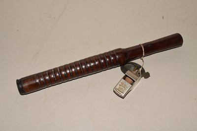 Lot 104 - A wooden truncheon and whistle
