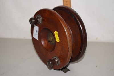Lot 106 - Large wooden centre pin fishing reel