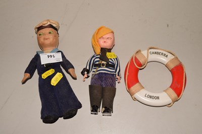 Lot 144 - A vintage sailors doll and life belt from the...