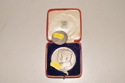 Lot 148 - A Royal Mint George V commemorative medallion...